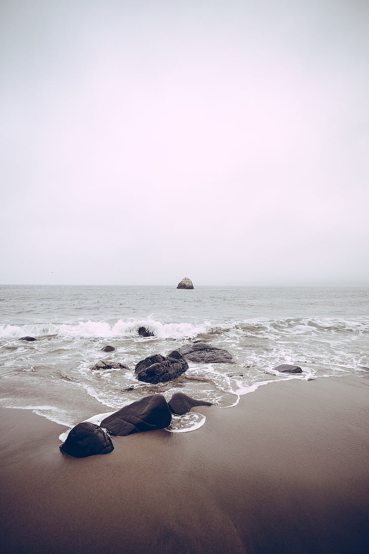 photo of rocks near beach