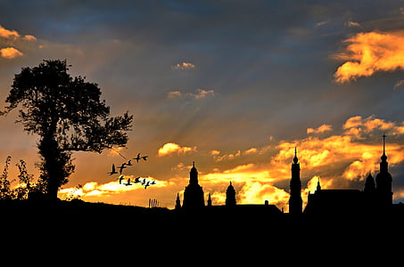 silhouette of church during daytime