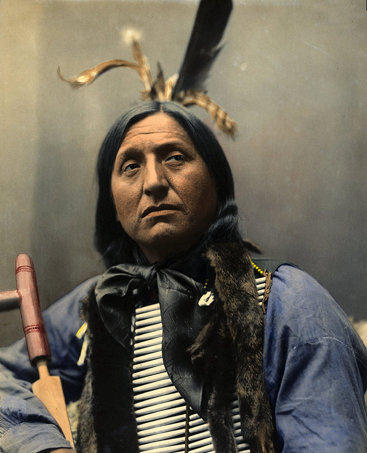 Native American with blue clothes