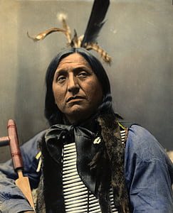 Native American with blue clothes