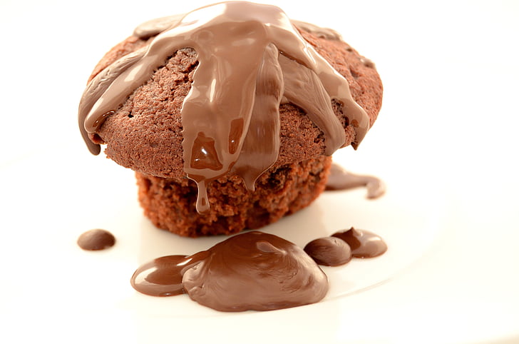 muffin with chocolate syrup toppings