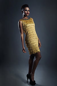 woman in yellow sleeveless dress