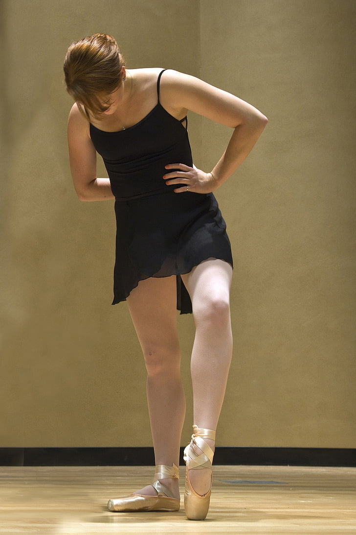 ballerina wearing black dress