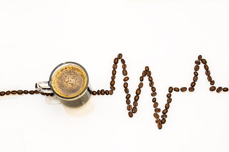 coffee on glass mug with coffee beans showing life line