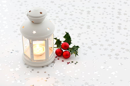 white tealight candle in candle lantern