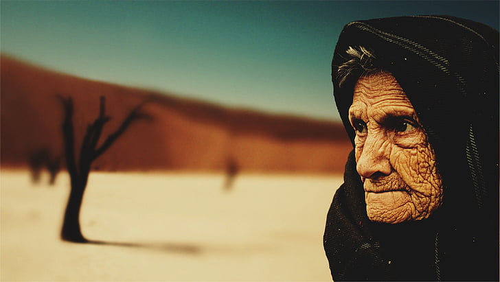 selective focus photography of woman wearing black hijab