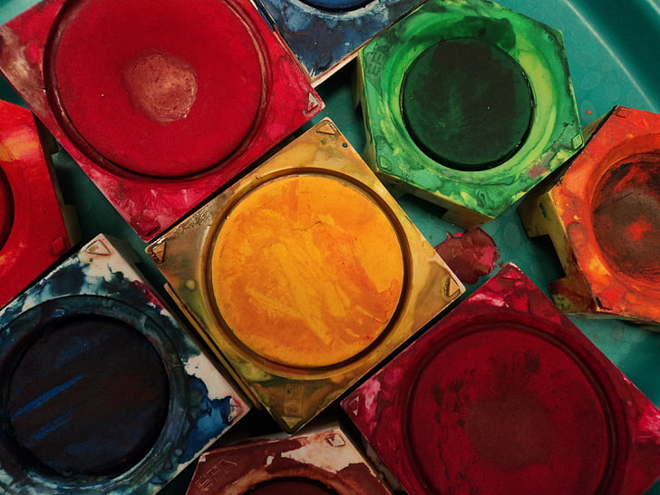 closeup photo of assorted-color paints