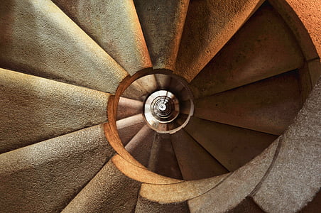 photo of brown spiral stair