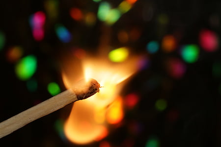 selective focus photo of lighted match