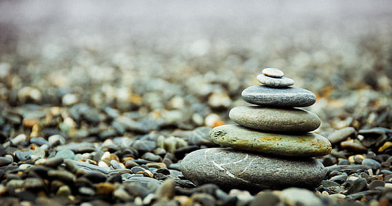 shallow photography of stone stacking