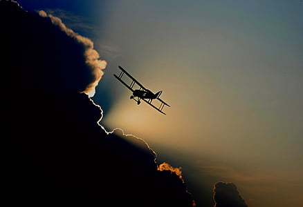 silhouette of biplane