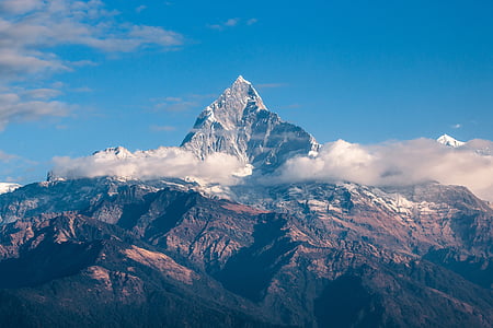 mountain surrounded with white clouds